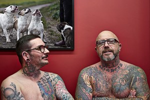 Two middle aged tattooists